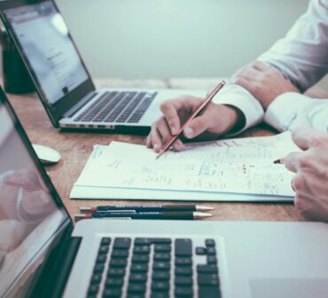 Notebook checklist of tasks to outsource for realtors
